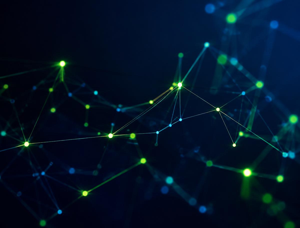 Abstract network of glowing connected nodes representing distributed software systems